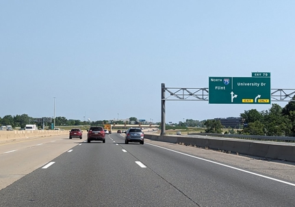 A roadside view of highway signage