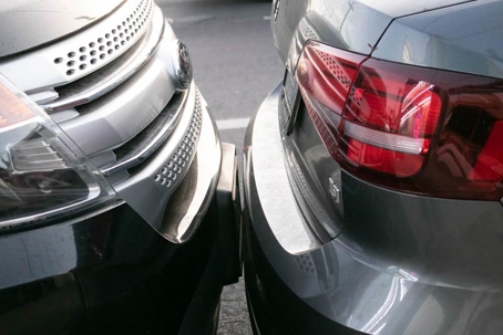 cars parked too closely together