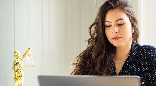 Woman in front of laptop