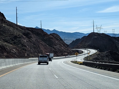 A winding road with mountains